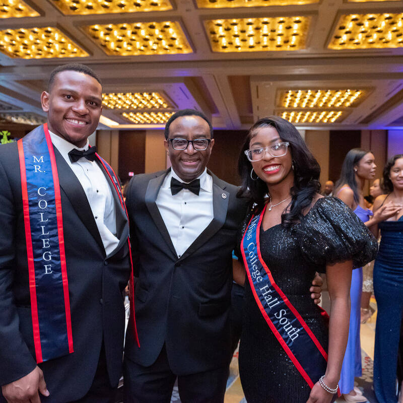 President Vinson posing with Mr and Miss College 