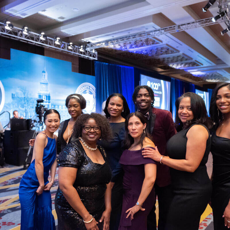 8 Charter Day Dinner 2024 attendees posing for a photo