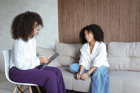 A young woman in counseling with a therapist.