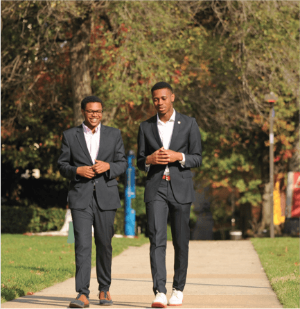 Howard University students in formal wear.