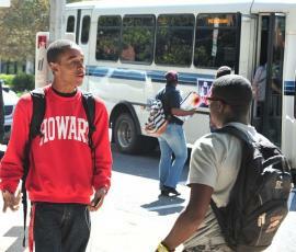 Howard students and a shuttle bus.
