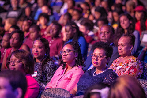 Group of people sitting at a conference