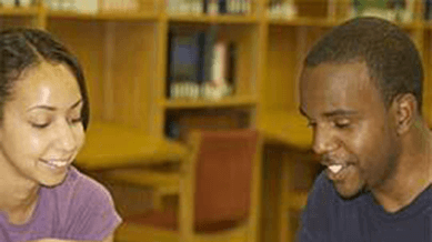 Student speaking with an advisor