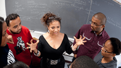 Teacher speaking to students