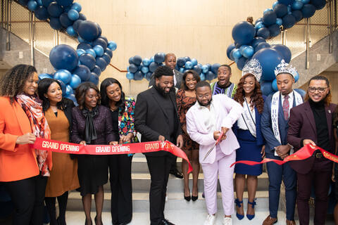 Student leaders and administrators at ribbon cutting for the Howard University LGBTQ+ Resource Center.