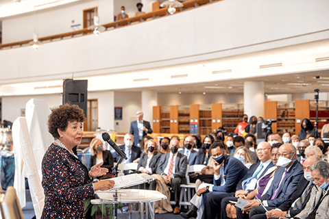 Woman speaking at a library event