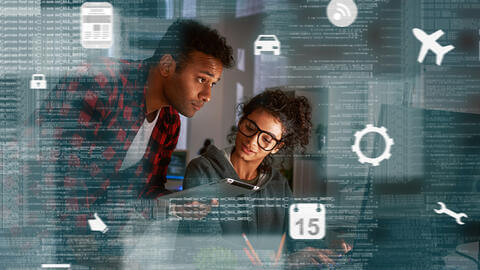 Two students working near a computer with graphics of code, calendar, and an airplane, a car, and a lock in the foreground; symbolizing all the applications for data science.